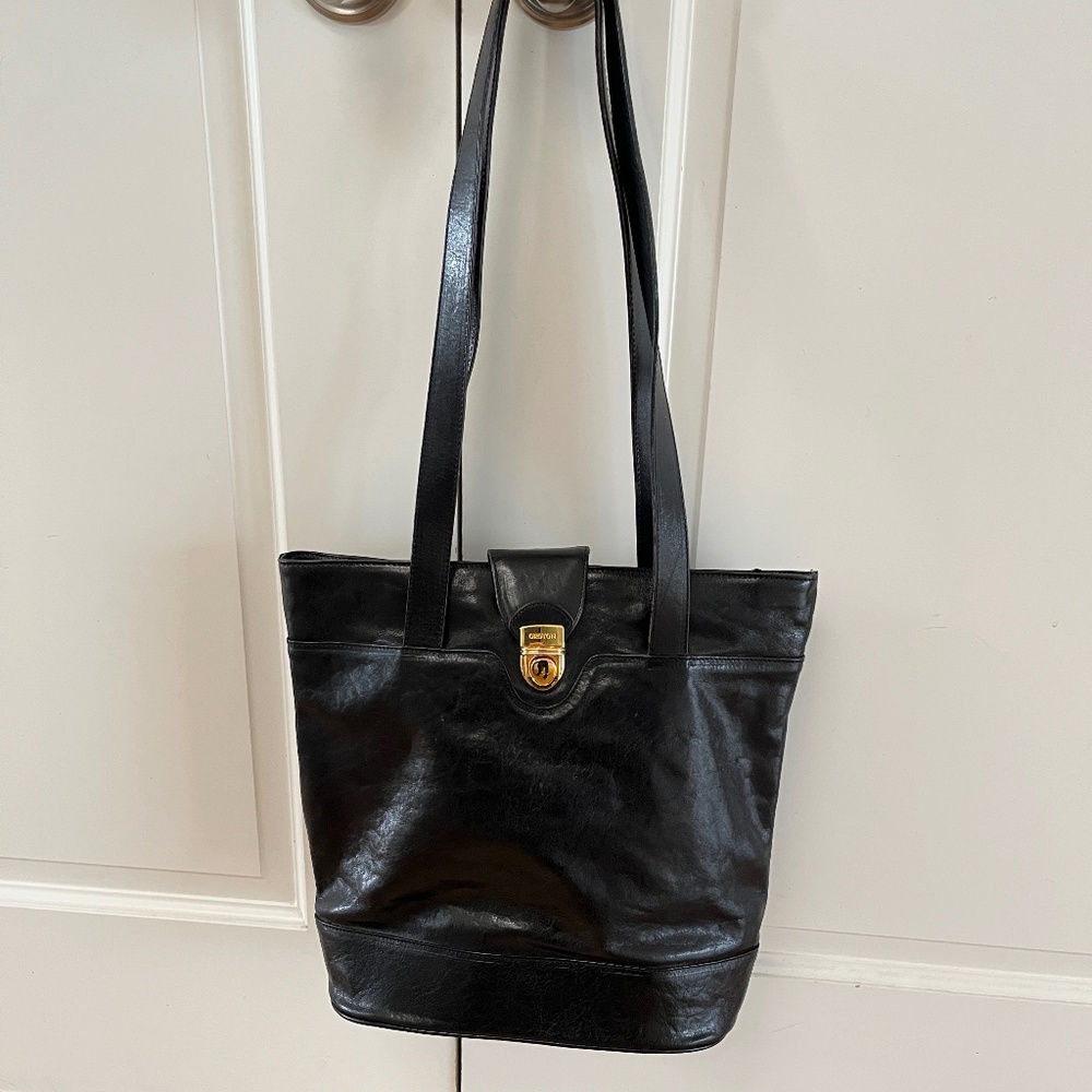 Beautiful black Oroton leather  bag with brass latch closure